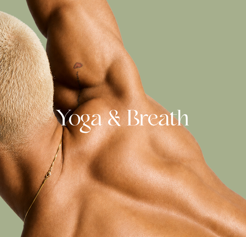 Close-up of a brown-skinned person with a small tattoo, gold chain, and “Yoga & Breath” text against a sage background.